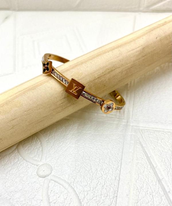 PULSERA DE ACERO RIGIDA LOUIS VUITTON DISE&Ntilde;O LV/FLOR ORO ROSA