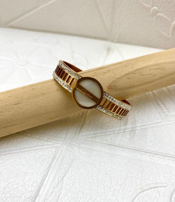 PULSERA DE ACERO RIGIDA CARTIER DISE&Ntilde;O CIRCULO CON PERLAS ORO ROSA