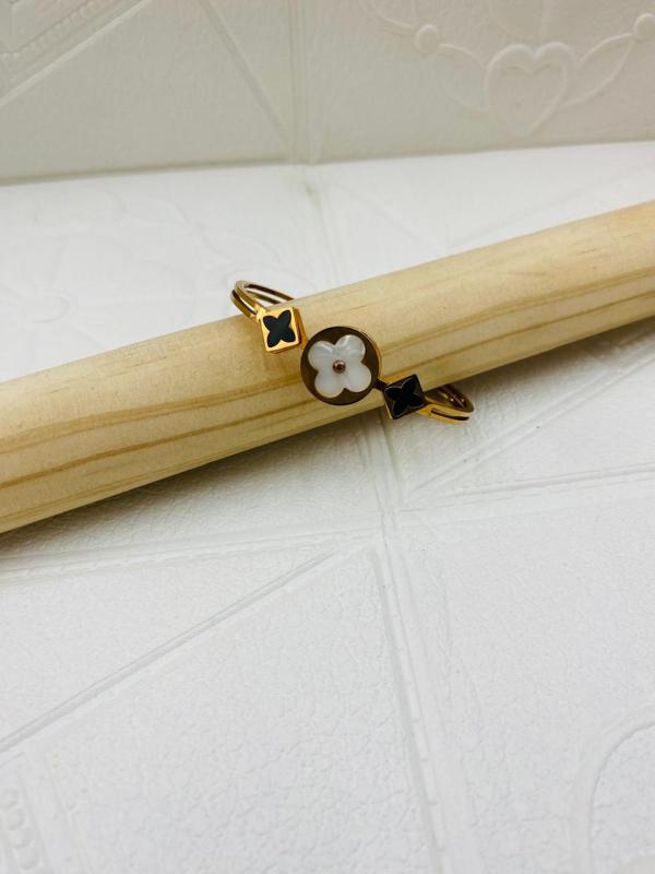 PULSERA DE ACERO RIGIDA LOUIS VUITTON DISE&Ntilde;O LV FLORES B/N ORO ROSA