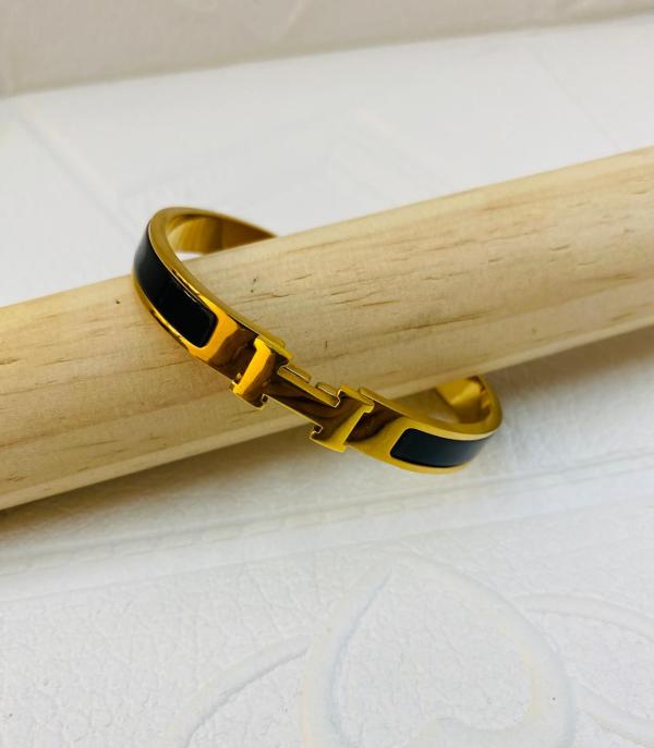 PULSERA DE ACERO RIGIDA HERMES DORADA DISE&Ntilde;O H NEGRO