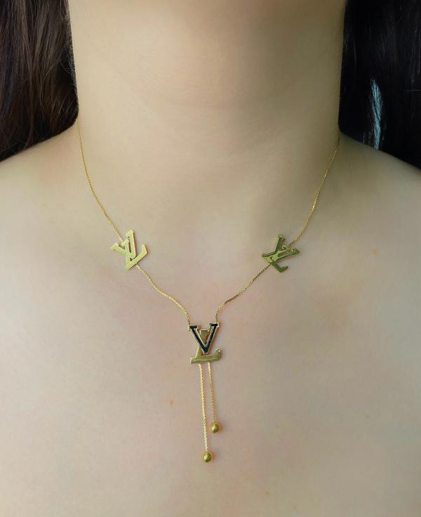 COLLAR DORADO LOGO/LV NEGRO