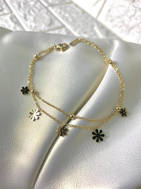 PULSERA DE ACERO DOBLE DORADA FLORECITAS/PELAS