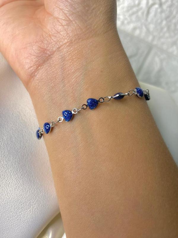 PULSERA DE ACERO PLATEADA CORAZONES AZULES