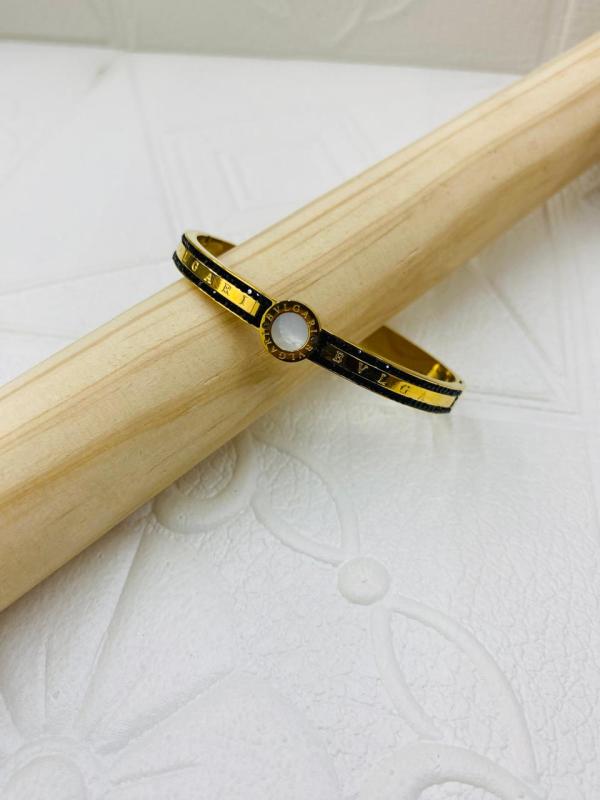 PULSERA DE ACERO RIGIDA BVLGARI DISE&Ntilde;O PIEDRAS NEGRAS DORADO