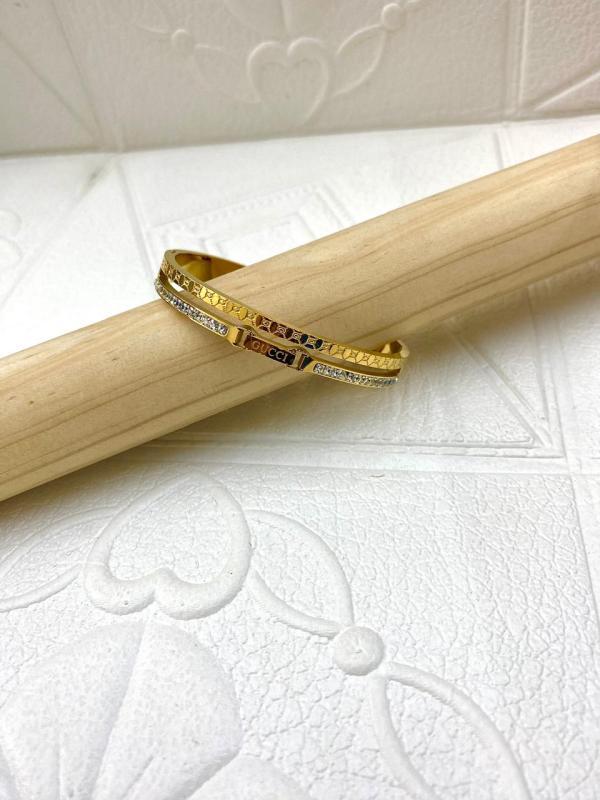 PULSERA DE ACERO RIGIDA GUCCI DISE&Ntilde;O PIEDRAS DOBLE DORADO