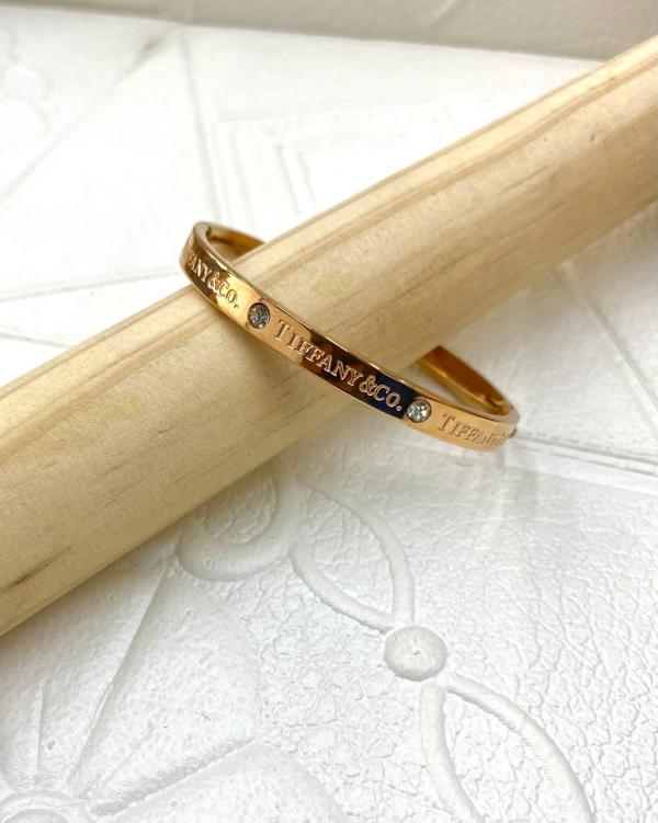 PULSERA DE ACERO RIGIDA TIFFANY & CO DISE&Ntilde;O PIEDRAS ORO ROSA