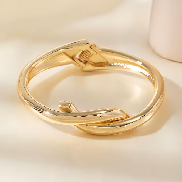 PULSERA DE ACERO RIGIDA GRUESA DORADO