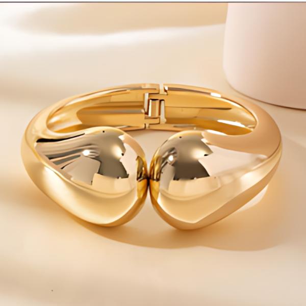 PULSERA DE ACERO RIGIDA GRUESA DORADO